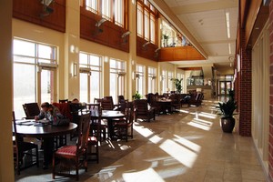 Students sit and study in the south hallway of Devon Energy Hall Monday afternoon. This hallway was just one of the many renovations that were done to Devon Hall. Jeremy Dickie/The Daily