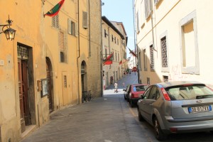 Our building on the left, Courso Italia mere feet ahead.