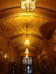 Bronze Chandeliers with geometric accents